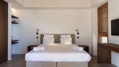 Bedroom 5: Located in a separate bungalow on the back. Twin beds (can be prepared as king size 