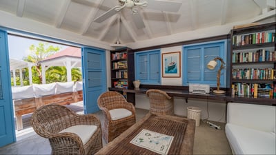 Library: Small office with library and games. Air Conditioning, Ceiling Fan. 