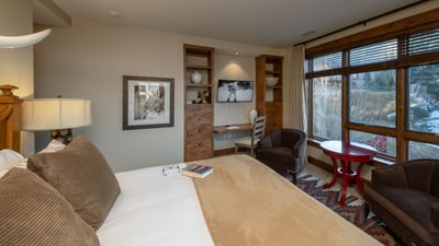 King suite with tv, desk and sitting area