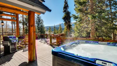 Hot tub with gas grill and outdoor seating