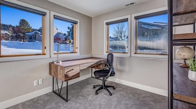 Office with closed door, off of the bunkroom on lower level