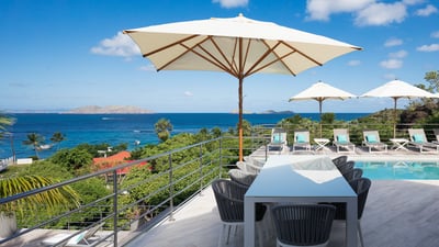 Outdoor Dining Area: Outdoor dining table for 10 people on the terrace facing the view. 