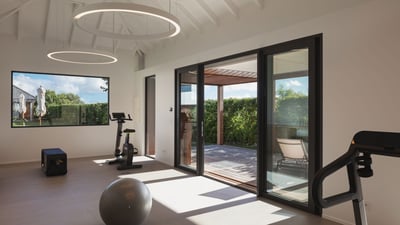 Fitness Room: Air-conditioning. HDTV, Apple TV, sonos sound system. Weight machine, treadmill, stati