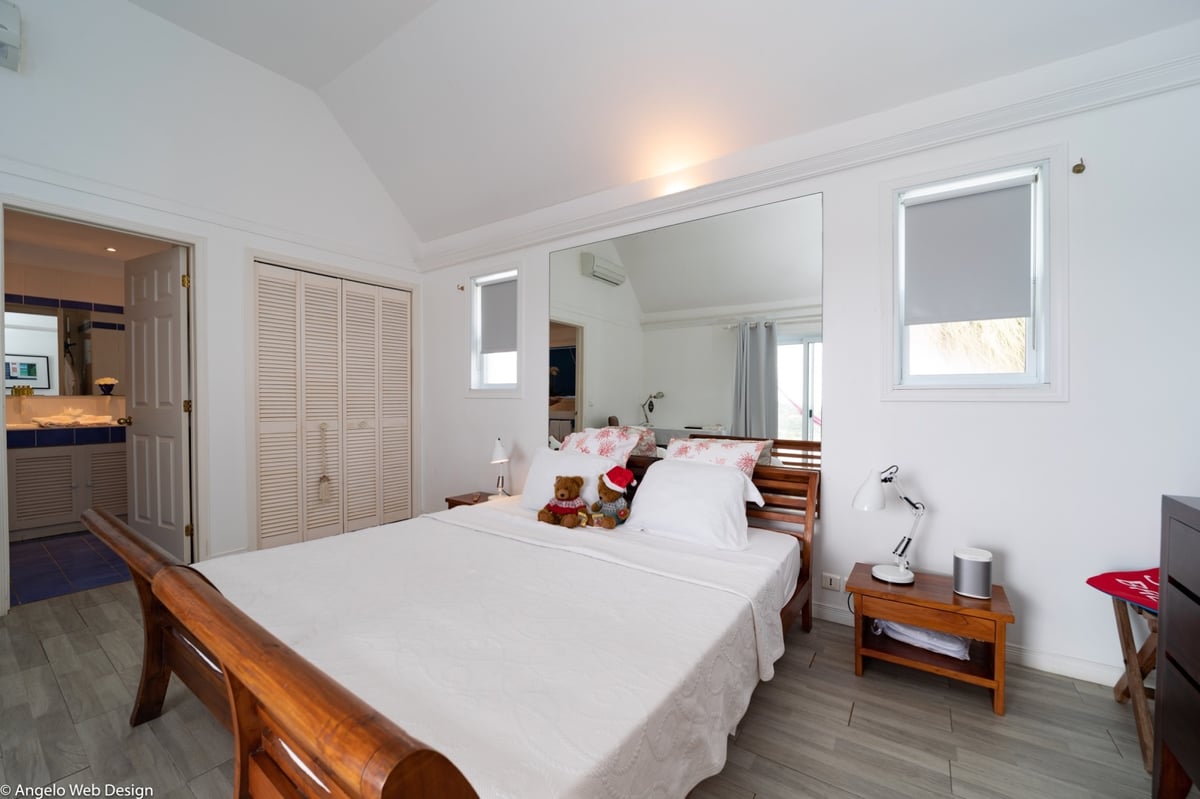 Master Bedroom: Located just past the living room. Opens onto the terrace and pool with ocean views. - Image 21