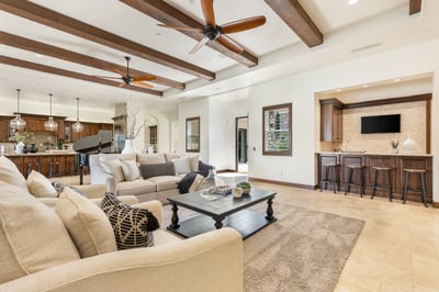 Great room perfect for entertaining with tons of seating and a great bar area with wine fridge and i