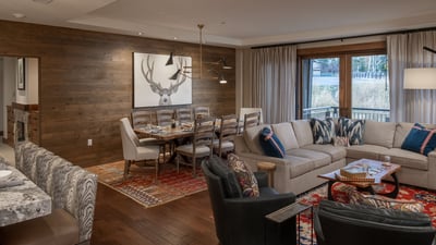Great room with comfortable seating, deck access