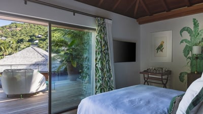 Bedroom 1: Located in a separate bungalow on an upper level.&nbsp;Euro king&nbsp;size bed, air condi