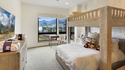 Bunkroom with desk area and views