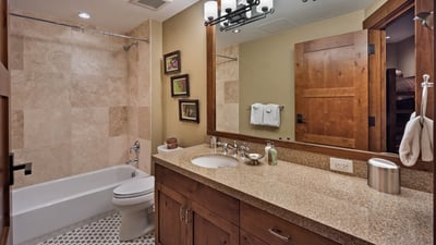 Queen and bunk bathroom