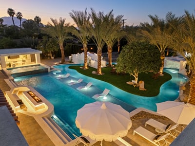 Tons of seating options around the pool and throughout the yard!