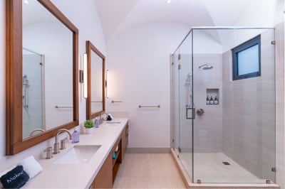 #1. His and Hers Double Sink Bathroom, a Spacious, Modern Shower and all the bathroom essentials.