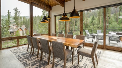 Dining area with floor to ceiling windows