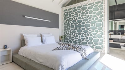 Bedroom 1: Located on the main level, and connected to the living-room. Queen size bed, air con