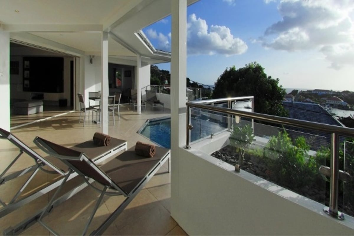 Pool & Terrace: Small infinity pool with steps, Splendid sunset views facing the Gustavia harbor and - Image 22