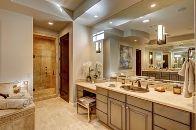 Primary ensuite bath with soaking tub, walk in shower, dual vanity and large walk in closet.