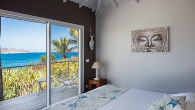 Bedroom 1: Air conditioning, fan, king size bed, safe. En-suite bathroom with shower. Access to