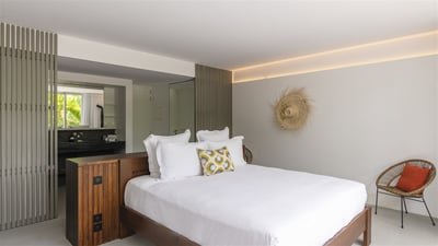 Bedroom 3: Located on the lower level, with garden view. A king size bed, air conditioning
