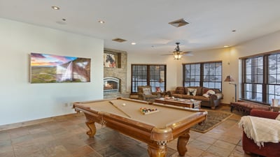Lower family room with billiards and TV