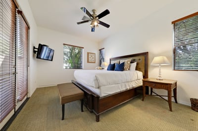 Guest bedroom 3 with king bed and en suite bathroom plus French Doors that lead to the courtyard!
