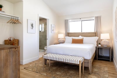 Guest bedroom 4 with en suite bath and cute storage area!