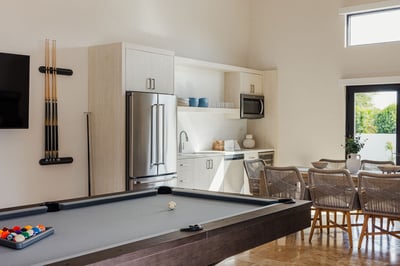 Your own game room equipped with a pool table & arcade games for some friendly competition. You'll a