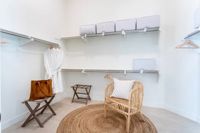 Primary closet with robes for your enjoyment