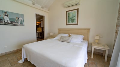 Bedroom 2: King size bed, mosquito screen, air conditioning, ceiling fan, safe, large dressing room.