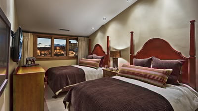 Bedroom with two full beds