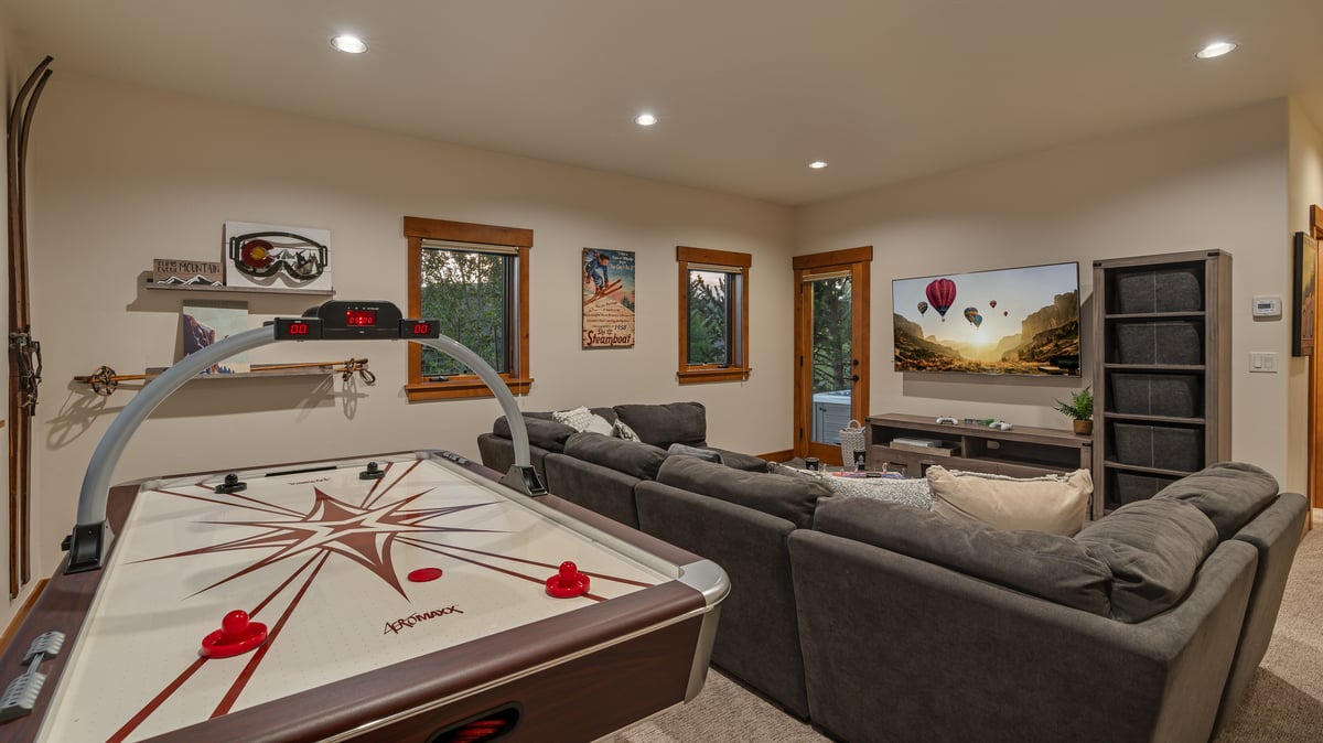 Family room on lower level with air hockey table - Image 7