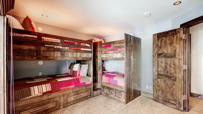 Bunk room on lower level, hall bath