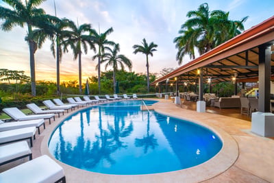 A spacious pool with volley ball net