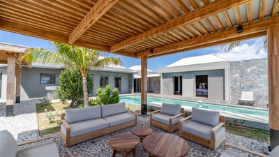 Outdoor Lounge & Dining Area: Under an ajoupa. Lounge area next to one of the two pools. Outdoor din