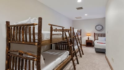 Lower Bunkroom 2 with four twins plus queen bed