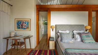 Bedroom 1: On an upper level. Master bedroom located in a separate bungalow, above the terrace. King