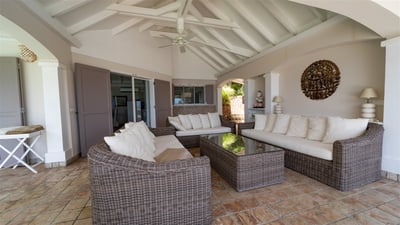 Outdoor Lounge: Nice lounge area on the covered terrace next to the pool. 