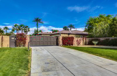 Private gated entrance and oversized driveway