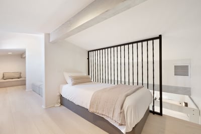 Twin bed and hidden seating area in the 3rd bedroom loft
