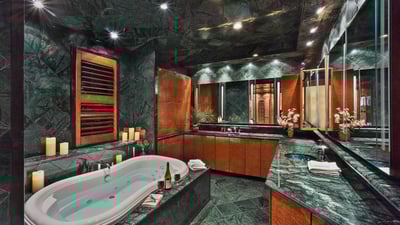 Primary ensuite with soaking tub and access to massive closet