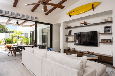 - Kick back on the cloud soft sectional and enjoy a movie on the smart TV setup
- Unique surfboard d