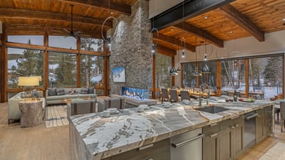 Professional grade kitchen overlooks great room and dining area, with breakfast nook adjacent to kit