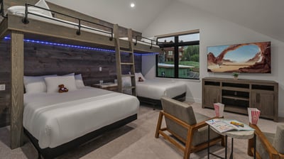 Enjoy the space in the bunk room on the upper level with two twin-over-queen bunk beds