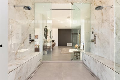 Primary shower with walk through access to the private wrap around balcony