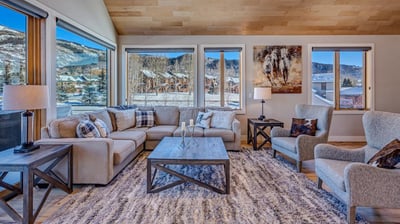 Great room has plenty of natural light and views