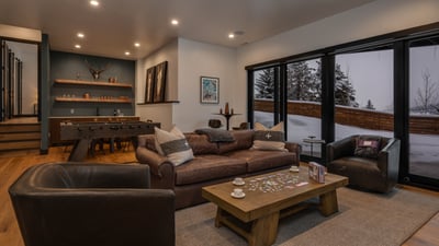 Lower level family room, with cozy seating and large TV
