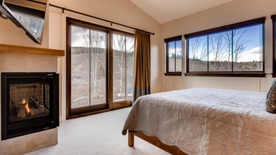 Primary suite on main level with river views