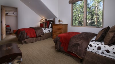 Twin bedroom on upper level, shares hall bath
