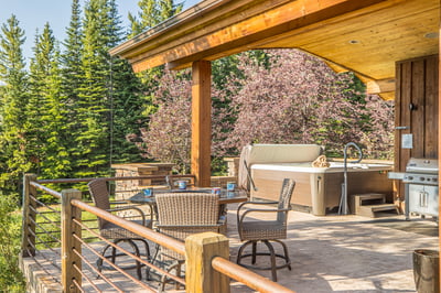 Soak under the open sky in your private hot tub, grill up a feast, and unwind on the covered patio