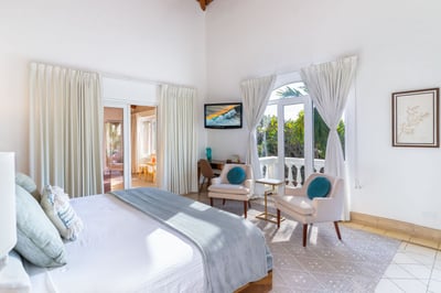 Living the royal life in our #1 Oceanview Master suite – King Bed, Private Balcony, AC, & a Smart TV