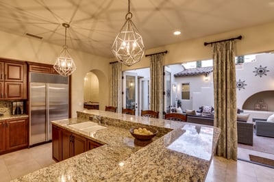 Kitchen has french doors that open to the courtyard