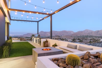 Outdoor kitchen and fire pit to sit back and enjoy a warm night under the stars.